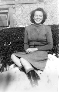 Emmie. Sitting in the back yard in Ireland, experiencing her first snow. She was in Standard 7 at the time. Emmie