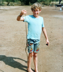 Andy with his dreaded red-lip pet snake Andy & snake